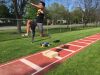 McQuaid senior Tobi Tella, shown here warming up for a meet this week, has the top triple and long jumps in Section V this season.