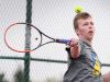 Webster Schroeder's Matt Gamble rips a forehand during his opening match against Geneva's Ryan Fishback during the Section V boys tennis state qualifier Saturday, May 21, 2016 at Pittsford Mendon High School. Gamble won the match, and went on to win the singles finals.