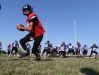 Brockport High School quarterback Ashton Scott rolls back during the team's practice.