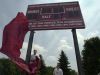 Then-players Angelo Suozzi, left, and James McKenna unveiled new scoreboard at Pittsford Mendon when it was dedicated in July 2002 in honor of Todd Pelino, a former Vikings player who was killed during the World Trade Center attacks on Sept. 11, 2001. The scoreboard at the school's new soccer field, which opened this month, also features the name of Pelino, a 1985 graduate who was 34 at the time of his death.