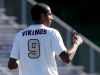 Adrian Padilla give a thumbs up to his coach Mike Hurley during the Pittsford Mendon soccer teams first game of the season against Aquinas.