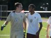Adrian Padilla (9) and Winston Bennett (26) of Pittsford Mendon celebrate their season-opening win against Aquinas. His team's vote for him to wear No. 9 "means these people that I grew up with trust me to lead them," Padilla says.