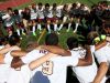 Adrian Padilla (9) and his Pittsford Mendon teammates get ready for the first game of the season against Aquinas.