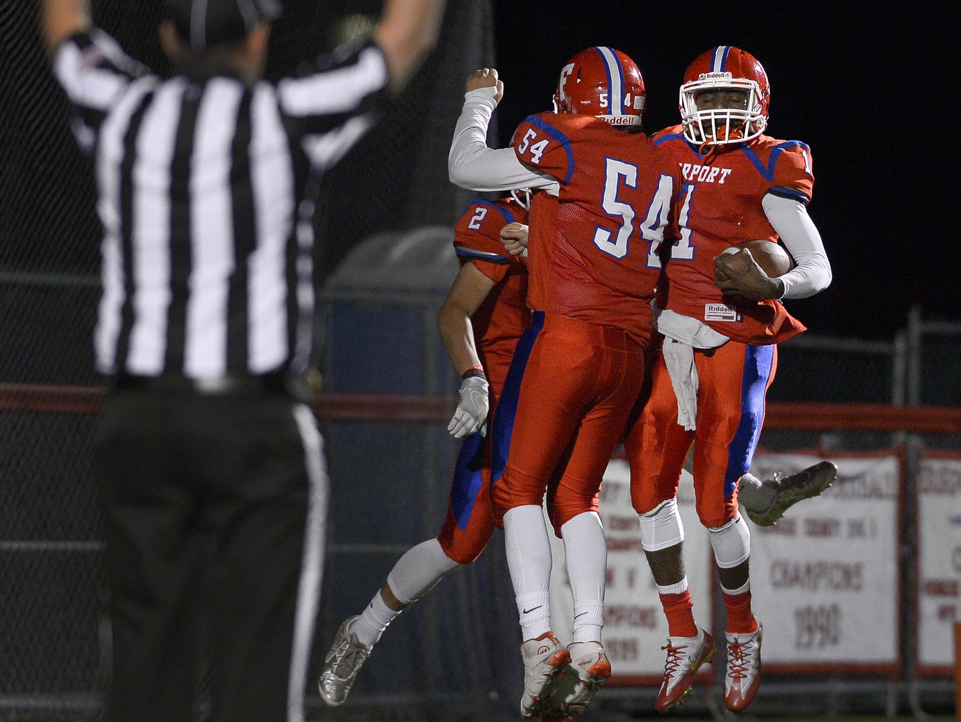 Fairport's Keshawn Howard, right, celebrates a touchdown run with teammate Mitch Disanto during the regular season.