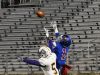 Woodlawn's Larry Moton goes high for a touchdown catch against Benton's Jayree Anderson at Shreveport's Independence Stadium.
