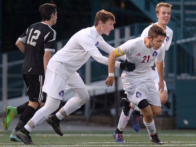 Fairport's Pete Critchlow (right) celebrates a goal with Nick Guida (Photo: Adrian Kraus, Democrat and Chronicle)
