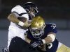 Sussex Tech's Deshown Sample (left) is hit by Salesianum's William Stradley at the line in the second quarter at Baynard Stadium Thursday.