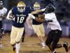 Salesianum's Nick Merlino (left) tries to push past Sussex Tech's Isaiah Brown on a long run that set up the Sals' first score in the first quarter at Baynard Stadium Thursday.