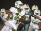 Fort Myers High School’s Darrian Felix scores a touchdown against Dunbar during first quarter play Friday at Dunbar High School in Fort Myers.