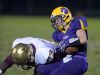 Hagerstown's Brandon Purtha runs the ball against Indianapolis Lutheran's Tyler Johnson during a sectional football game Friday, Nov. 4, 2016 in Hagerstown.