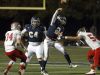 Pope John Paul II QB Ben Brooks gets the pass of despite the rush of Baylor's Walker Culver in Hendersonville, TN on Fri. Nov. 4, 2016. Photo by Dave Cardaciotto