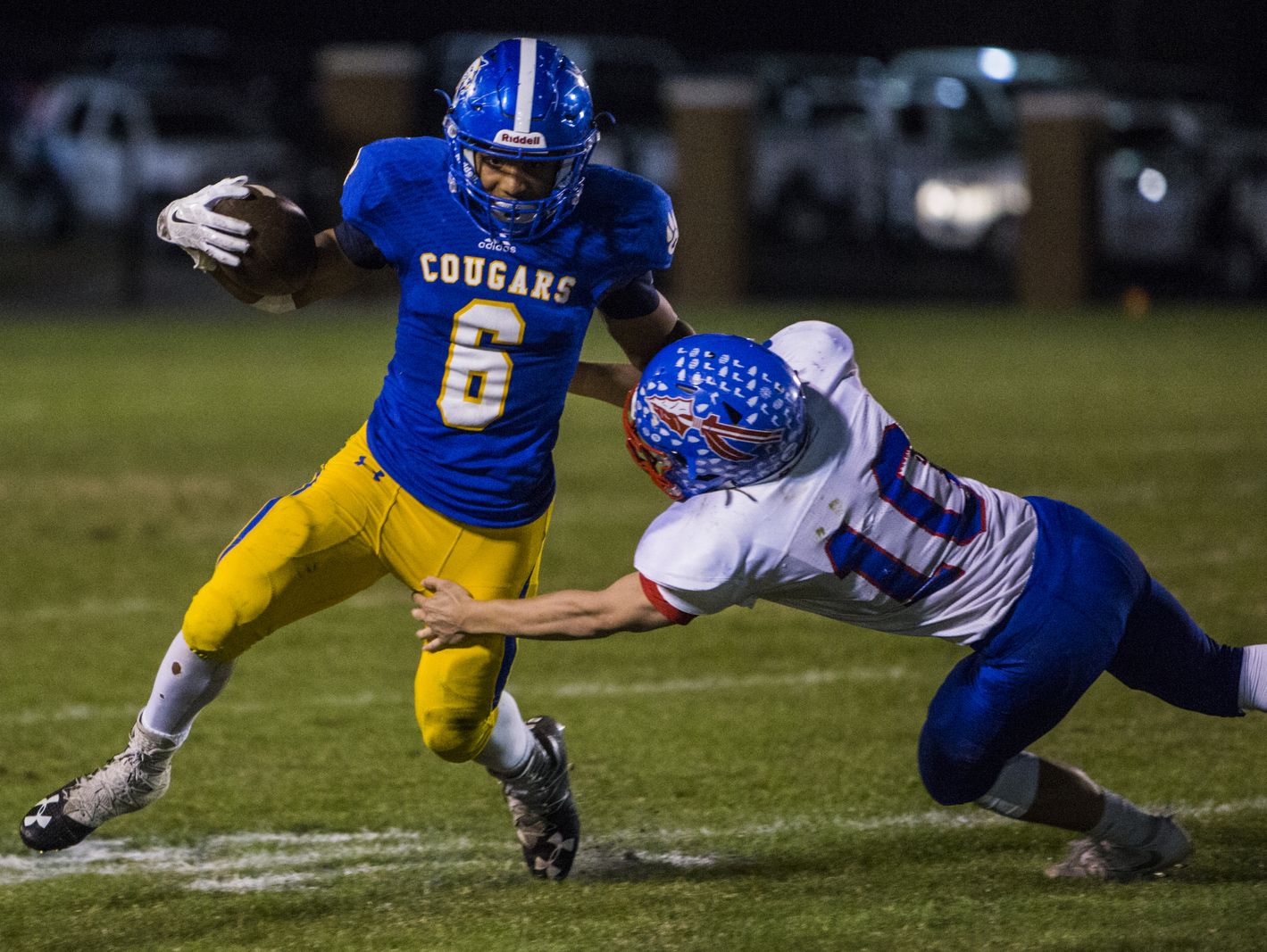 Jermaine Mason of Goodpasture Christian School runs past the Harpeth High School defense. The Cougers defeated the Indians 36-20