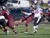 Earlham's Jordan Christian punts the ball against Bluffton Saturday, Nov. 5, 2016 during a football game at Earlham College in Richmond.