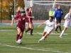 Arlington's Caroline Neville, left, looks for an open teammate during Saturday's Class AA regional final against Monroe-Woodbury.