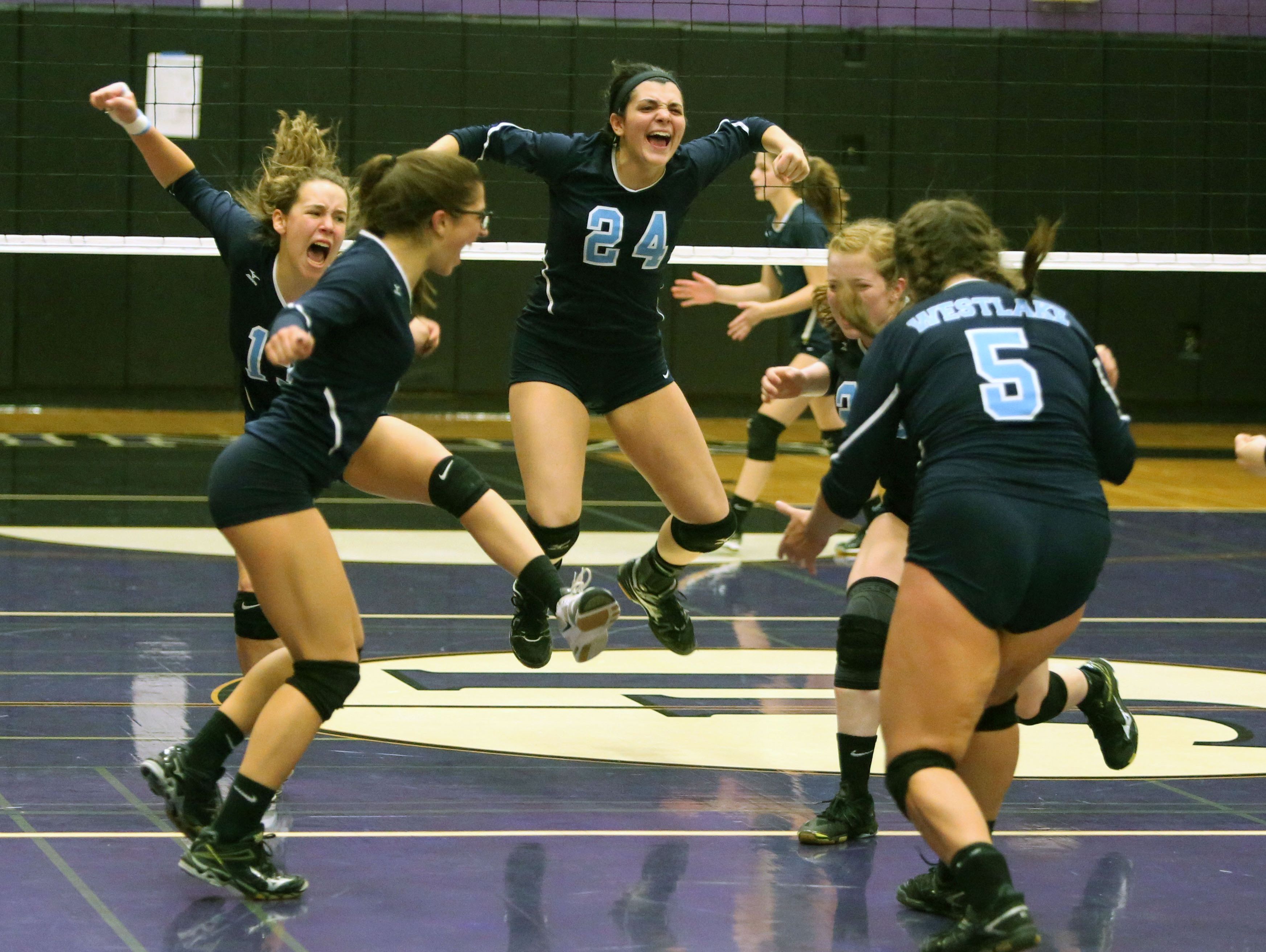 Westlake Captain Kelly Martin celebrates a point near the end of their match against Lourdes during the Section 1 Class B volleyball final at John Jay High School in Cross River, Nov. 5, 2016. Westlake beat Lourdes 3 games to 2.