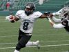Bishop Kearney's #8 Dahmir Pross runs with pressure from East Rochester/Gananda's #12 Dimitri Georgantonis.