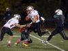 Matthew Pires of Somers gets airborne on his way to a 60-yard punt return against Yorktown during the Section 1 Class A football championship at Mahopac High School Nov. 6, 2016.