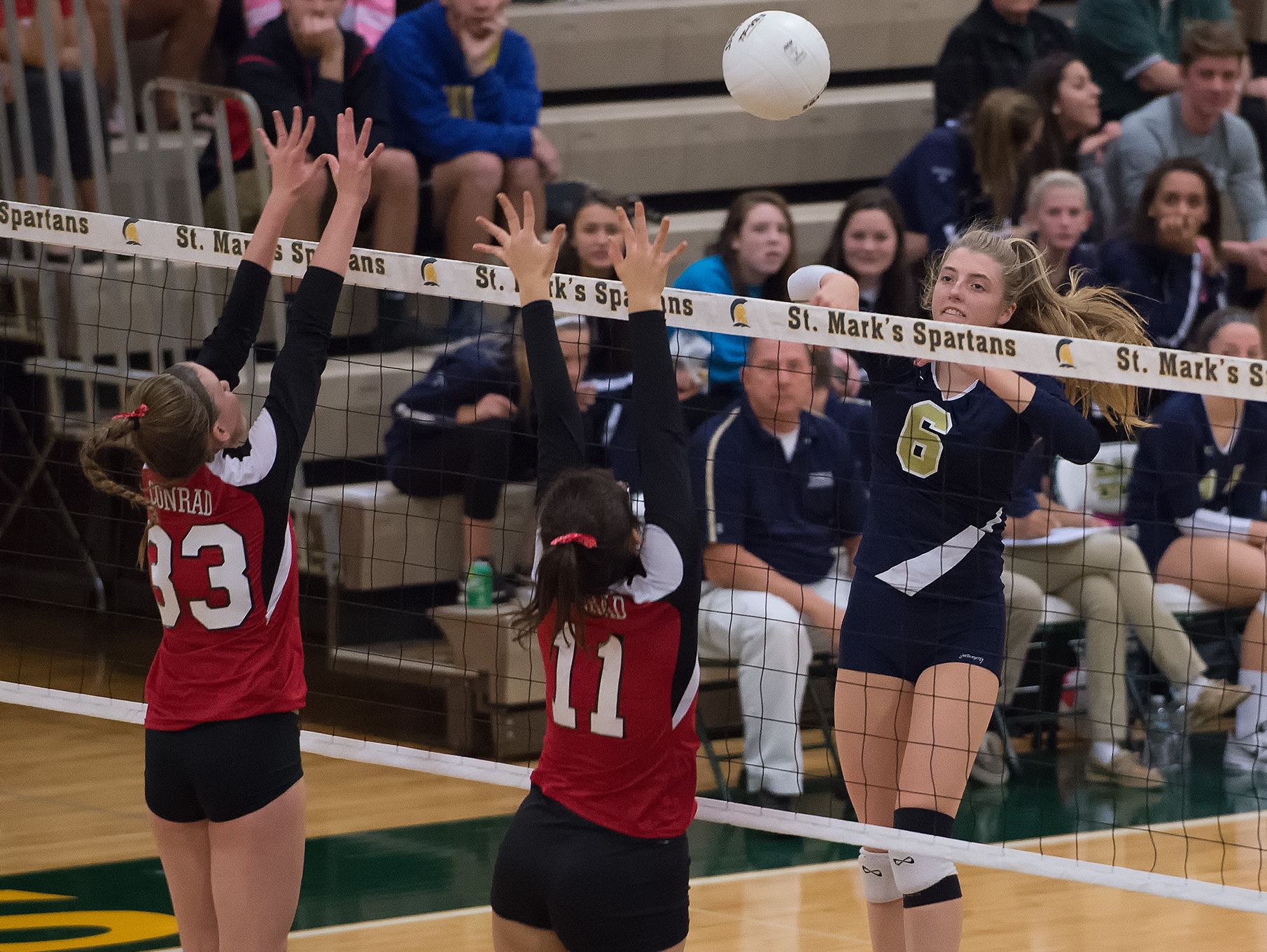 Delaware Military Academy's Victoria Taylor (6) with a spike in the second round game of the DIAA State Volleyball Tournament against Conrad.
