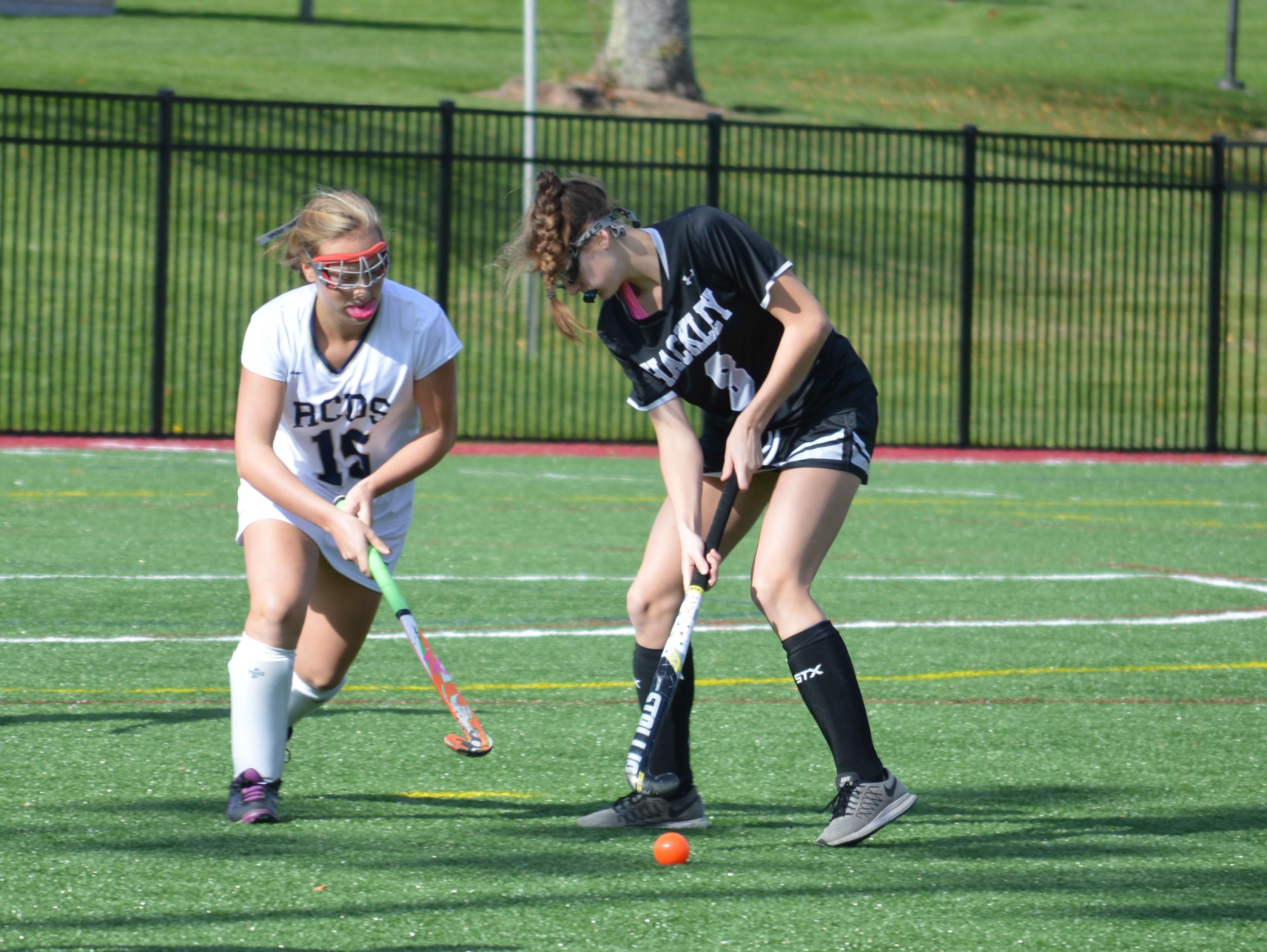 Hackley School's Karina Bridger defends against Rye Country Day's Katherine Holtby during the 2016 NYSAIS field hockey final at Manhattanville College on Nov. 6, 2016.