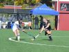 Hackley School's Meghan Cunningham attempts to move the ball past Rye Country Day's Natalie Alpert during the 2016 NYSAIS field hockey final at Manhattanville College on Nov. 6, 2016.