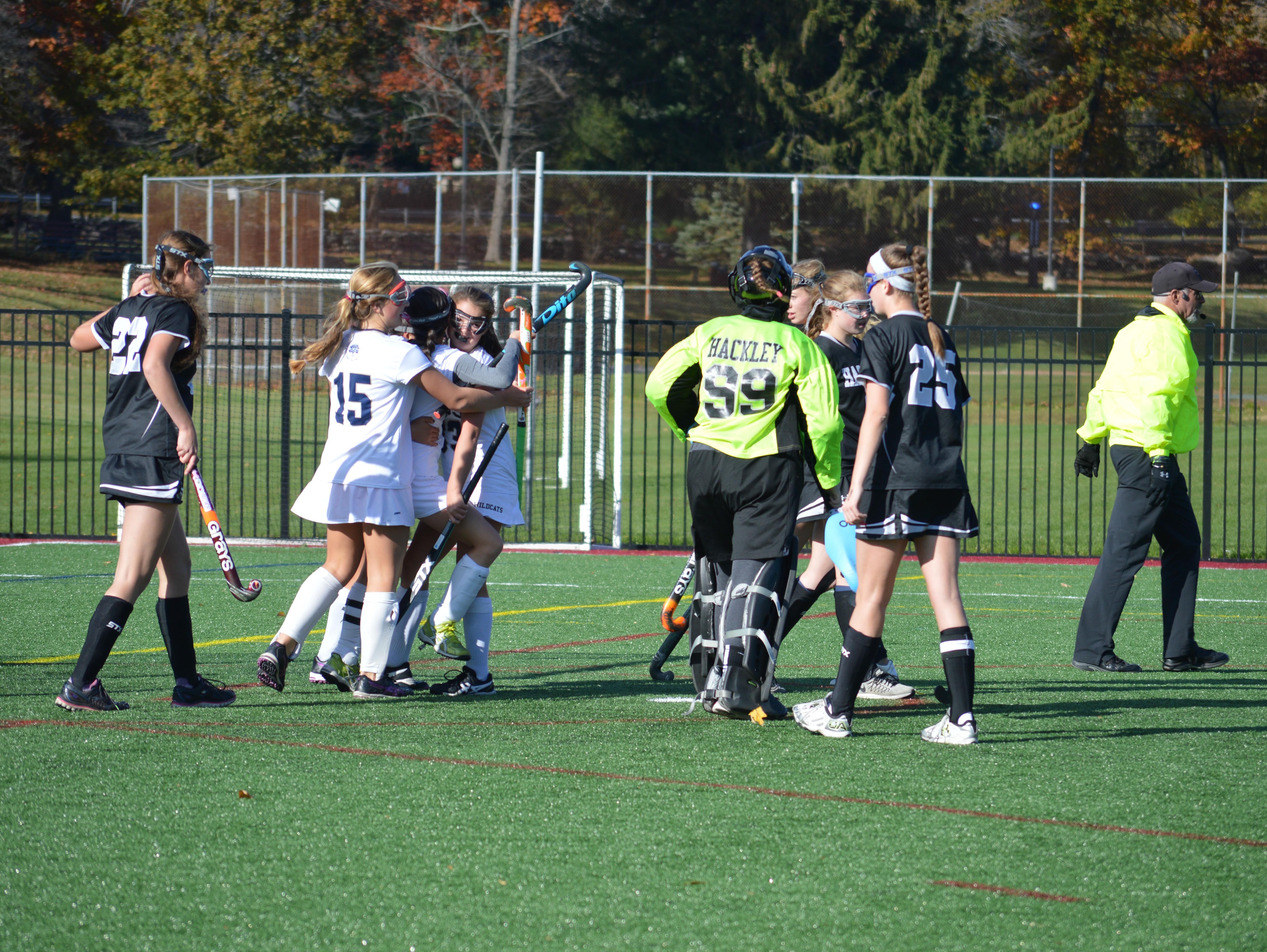 Rye Country Day School (in white) celebrates after scoring the game-winning goal in overtime in the 2016 NYSAIS field hockey final at Manhattanville College on Nov. 6, 2016.