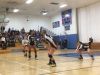 Ossining junior Lauren Ojito (right) digs a ball in the final set of a Class AA state regional volleyball semifinal at SUNY Ulster.