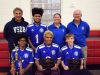 Members and coaches of VSDB's national-champion goalball team pose with their trophy and awards in Staunton on Tuesday, November 9, 2016. Front, from left, Zion Walker, Sean Walker, Christian King; back, from left, head coach Rory Swientek, Tyrone Brotherton, and assistant coaches Kristy McClain and Jim Kiser.