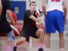 Penfield's Jack Bittker gets low to pass the ball during a regular season game at Fairport.