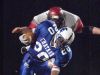 Bishop Chatard's Dray Mason (#20) avoids the tackles of Danville's John Lawrence and Jake Powers, Nov. 8, 2002.