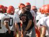 Wes Beachler, center, coached the Republic High School football team for four years.