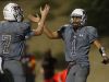 David Talley and Marques Prior of Rancho Mirage High School celebrate Prior's touchdown in the third quarter of their CIF post-season game against Los Amigos High School at home.