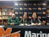 Paige Tranchida, middle, poses with her parents, Mike and Tracy, after signing her Letter of Intent to Lake Erie College.