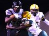Parkway's Terrace Marshall tries to get past Captain Shreve's defense Friday evening at Preston Crownover Stadium.