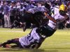 Captain Shreve's Corey Milligan tries to get past Parkway's defense Friday evening at Preston Crownover Stadium.