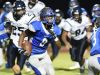 Woodbridge's Jamon Kane, seen here against Wilmington Friends, ran for two rushing touchdowns as the Blue Raiders ended the regular season 10-0 with a 3907 win over Delmar on Friday.