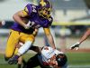Monett High School tight end Alex Turner (44) stiff arms Dutchmen linebacker Logan Decker (4) during second quarter action of the quarterfinal playoff game between Monett High School and Owensville High School played at Burl Fowler Stadium in Monett, Mo. on Nov. 12, 2016. The Monett Cubs won the game 48-20.