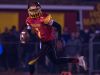 Glasgow's quarterback Isaiah Wilson (1) rolls out looking for a pass during the second quarter against Caravel in the first quarter against Glasgow in the opening round of the DIAA Division II playoffs at Glasgow High School.
