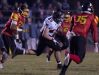 Caravel's Jacob Laznik (45) runs the ball through Glasgow's defense in the opening round of the DIAA Division II playoffs at Glasgow High School.