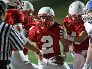 Beechwood RB Aiden Justice celebrates his TD with teammates in the game against Kentucky Country Day in the KHSAA Football Playoffs at Beechwood High School.