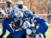 Jacob Hudson of DMA is tackled by a wall of St. Geroges defenders as DMA plays at St. Georges in the opening round of DIAA Division II playoffs.