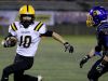 Cascade's Jaaron Bruce (10) moves past Cottage Grove's Jacob Woods (42) in the first half of the Cascade vs. Cottage Grove OSAA Class 4A semifinal football game at Hillsboro Stadium on Saturday, Nov. 19, 2016.