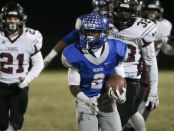 Terrique Riddick runs for a big gain against Caravel in the second quarter during the Division II semifinals at Woodbridge Friday.