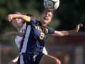Victor's Abby Richards, right, wins a header in front of Penfield's Bre McGrath during a regular season game at Penfield High School on Wednesday, Sept. 14, 2016. Victor beat Penfield 2-1.