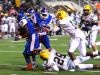 Woodlawn's Trivenskey Mosley tries to get past Cecilia's defense Friday evening at Lee Hedges Stadium.
