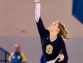 Morgan Andrews of DMA serves as Ursuline and DMA play in the DIAA volleyball finals at UD's Bob Carpenter Center.