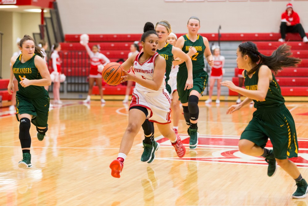 Jeffersonville's Jasmine Lilly (5) looks to pass the ball during the Girls Basketball game between Floyd Central and Jeffersonville at Jeffersonville high school. Photo by Adam Creech/Special to The Courier-Journal