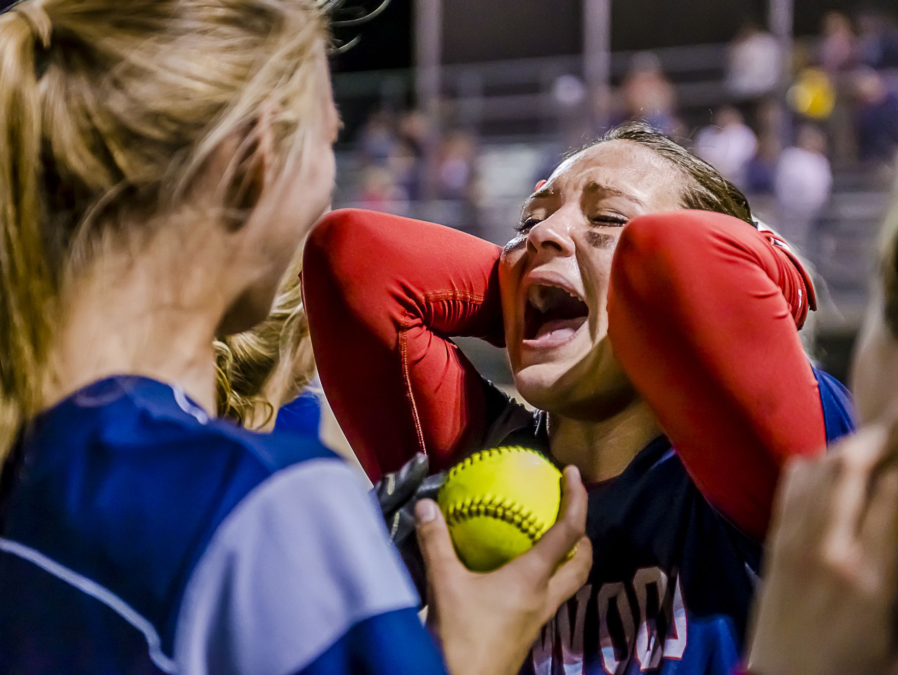 Sierra Stoepker of Lakewood is overcome with emotion as a teammate presents her with the game ball after she hit a walk-off homerun to win their Softball Classic championship Friday.
