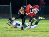 Riverheads' Tyler Smith stays on his feet with the ball after jumping over Wilson Memorial's Logan Leche to avoid the tackle during a football game played in Greenville on Friday, Oct. 21, 2016.