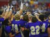 Winner players celebrate their 54-0 win over Groton Area in the 2016 South Dakota State Class 11B Football Championship game Friday, Nov. 11, 2016, at the DakotaDome on the University of South Dakota campus in Vermillion, S.D.