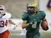 Iowa City West's Oliver Martin runs the ball against Cedar Rapids Washington Friday, Nov. 11, 2016, during their 4A state semifinal game at the UNI Dome in Cedar Falls.
